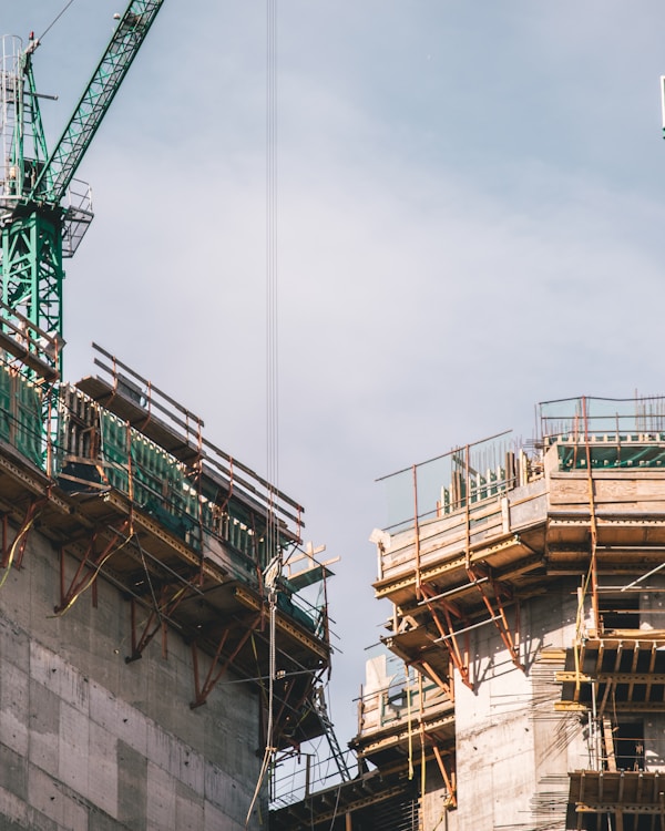 Construction project with cranes and concrete structures